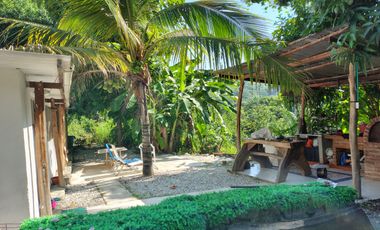 TERRENO DE 5200 MTS2 BORDEADO EN 100 MTS POR VIA VEHICULAR MINCA SANTA MARTA