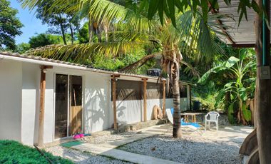 TERRENO DE 5200 MTS2 BORDEADO EN 100 MTS POR VIA VEHICULAR MINCA SANTA MARTA
