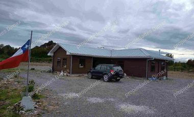 Parcela con casa a 10 minutos del centro