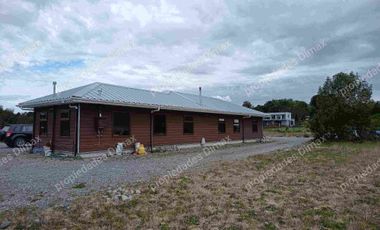 Parcela con casa a 10 minutos del centro