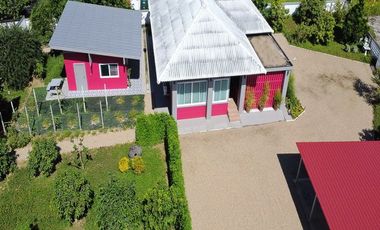 Immaculate Country Home with Separate Guest Cottage • Private Walled Plot • Freehold or 30-Year Registered Lease