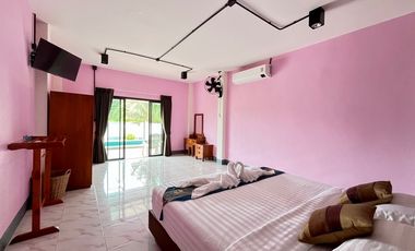 A private pool villa with 3 bedrooms and 3 bathrooms, along with parking space for 2 cars