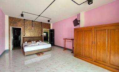 A private pool villa with 3 bedrooms and 3 bathrooms, along with parking space for 2 cars