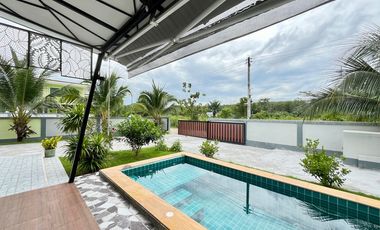 A private pool villa with 3 bedrooms and 3 bathrooms, along with parking space for 2 cars