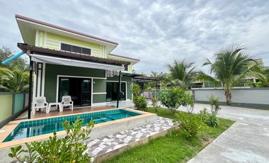 A private pool villa with 3 bedrooms and 3 bathrooms, along with parking space for 2 cars