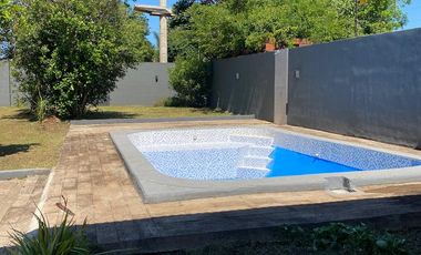 CASA CON QUINCHO Y PILETA