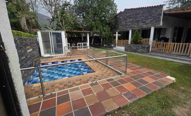 VENDO HERMOSA PARCELA VIA GUATIGUARA PISCINA BBQ JACUZZI AREA 50O METROS