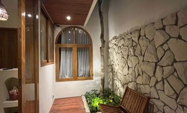 A Warm & Natural Family Space in Jogja, Featuring an Open Space Concept and Natural Materials