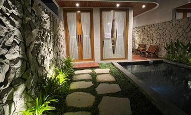 A Warm & Natural Family Space in Jogja, Featuring an Open Space Concept and Natural Materials