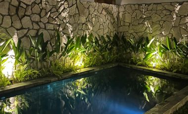 A Warm & Natural Family Space in Jogja, Featuring an Open Space Concept and Natural Materials