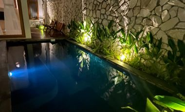 A Warm & Natural Family Space in Jogja, Featuring an Open Space Concept and Natural Materials