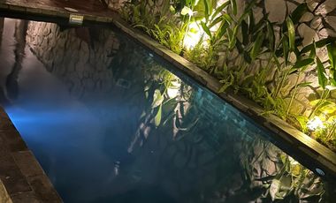 A Warm & Natural Family Space in Jogja, Featuring an Open Space Concept and Natural Materials