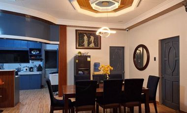 Serene Charm Elegant Blue Bungalow on a Spacious Lot