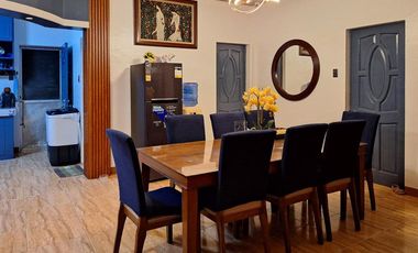 Serene Charm Elegant Blue Bungalow on a Spacious Lot