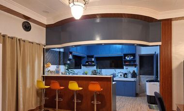 Serene Charm Elegant Blue Bungalow on a Spacious Lot