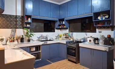 Serene Charm Elegant Blue Bungalow on a Spacious Lot