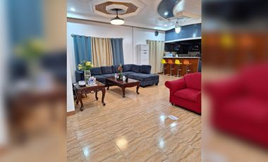 Serene Charm Elegant Blue Bungalow on a Spacious Lot