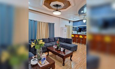 Serene Charm Elegant Blue Bungalow on a Spacious Lot