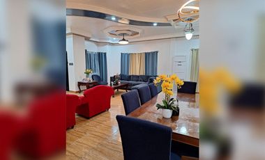 Serene Charm Elegant Blue Bungalow on a Spacious Lot