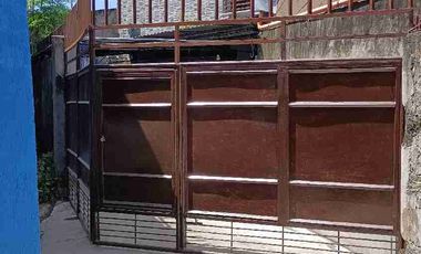 SINGLE ATTACHED HOUSE WITH 2 BEDROOMS AND GATED NOT IN THE SUBDIVISION.