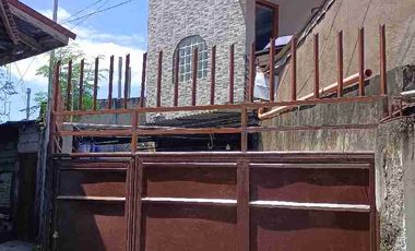 SINGLE ATTACHED HOUSE WITH 2 BEDROOMS AND GATED NOT IN THE SUBDIVISION.
