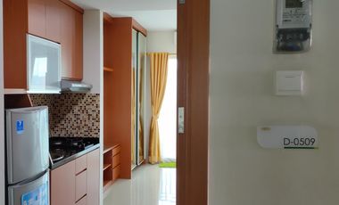 Studio Lantai 5 Tower Mahogani Woodland Park Residence by MoFU