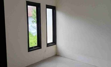 rumah cluster di komplek industri konveksi