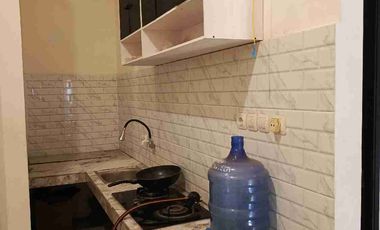 rumah cluster di komplek industri konveksi