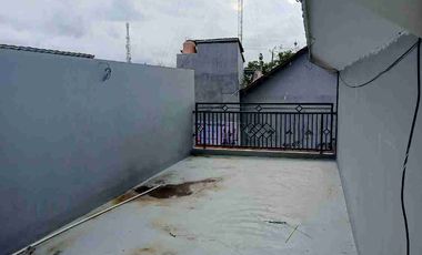 rumah cluster di komplek industri konveksi