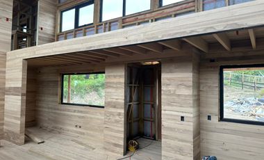 Vive Frente al MAR en Castro. Sitio urbano con casa en Puntilla Ten Ten