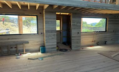 Vive Frente al MAR en Castro. Sitio urbano con casa en Puntilla Ten Ten