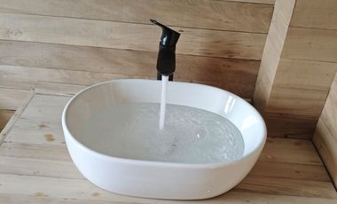 Vive Frente al MAR en Castro. Sitio urbano con casa en Puntilla Ten Ten