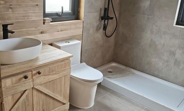 Vive Frente al MAR en Castro. Sitio urbano con casa en Puntilla Ten Ten