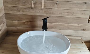 Vive Frente al MAR en Castro. Sitio urbano con casa en Puntilla Ten Ten