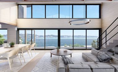 Vive Frente al MAR en Castro. Sitio urbano con casa en Puntilla Ten Ten