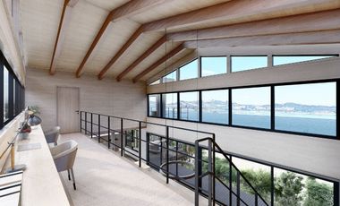 Vive Frente al MAR en Castro. Sitio urbano con casa en Puntilla Ten Ten