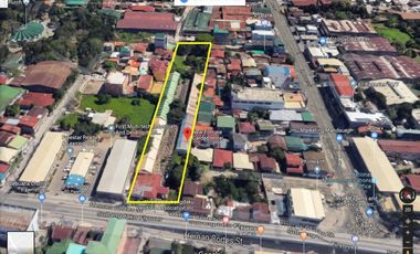 PRIME COMMERCIAL LOT WITH INCOME-GENERATING HOTEL — FOR SALE
