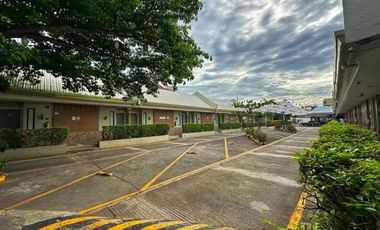 PRIME COMMERCIAL LOT WITH INCOME-GENERATING HOTEL — FOR SALE