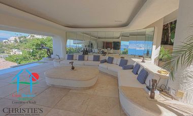 Casa con alberca con cascada, mesa de teppanyaki, palapa y vistas panorámicas al mar