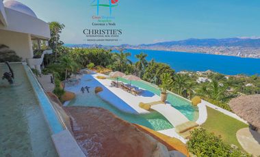 Casa con alberca con cascada, mesa de teppanyaki, palapa y vistas panorámicas al mar