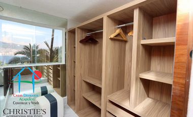 Casa con alberca con cascada, mesa de teppanyaki, palapa y vistas panorámicas al mar