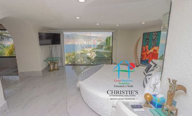 Casa con alberca con cascada, mesa de teppanyaki, palapa y vistas panorámicas al mar