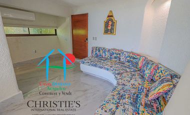 Casa con alberca con cascada, mesa de teppanyaki, palapa y vistas panorámicas al mar