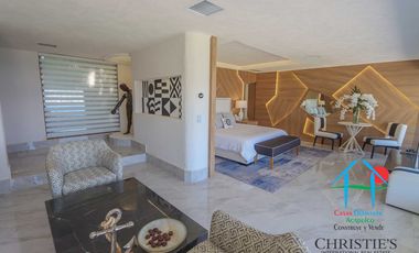 Casa con alberca con cascada, mesa de teppanyaki, palapa y vistas panorámicas al mar