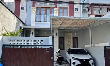 FOR SALE MODERN HOUSE WITH A BALCONY AND BEAUTY GARDEN AT DENPASAR