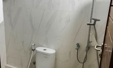 FOR SALE MODERN HOUSE WITH A BALCONY AND BEAUTY GARDEN AT DENPASAR