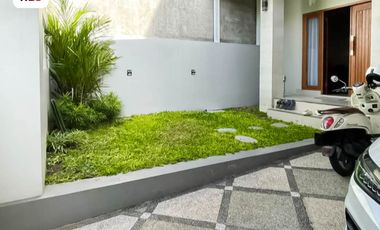 FOR SALE MODERN HOUSE WITH A BALCONY AND BEAUTY GARDEN AT DENPASAR