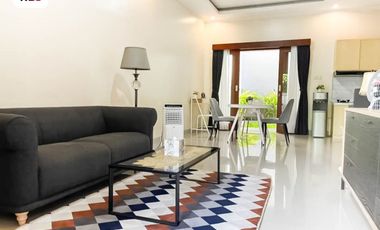 FOR SALE MODERN HOUSE WITH A BALCONY AND BEAUTY GARDEN AT DENPASAR