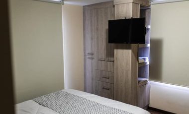 Casa de 3 dormitorios mas suite en el tercer piso con acceso independiente en el centro de Baños 2 parqueaderos