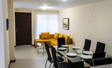 Casa de 3 dormitorios mas suite en el tercer piso con acceso independiente en el centro de Baños 2 parqueaderos